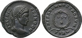 CRISPUS (Caesar, 316-326). Follis. Treveri. 

Obv: IVL CRISPVS NOB C. 
Laureate head right.
Rev: CAESARVM NOSTRORVM / PTR (crescent). 
VOT / X in...
