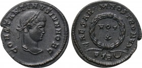 CONSTANTINE II (Caesar, 316-337). Follis. Treveri. 

Obv: CONSTANTINVS IVN NOB C. 
Laureate head right.
Rev: CAESARVM NOSTRORVM / PTR (crescent). ...