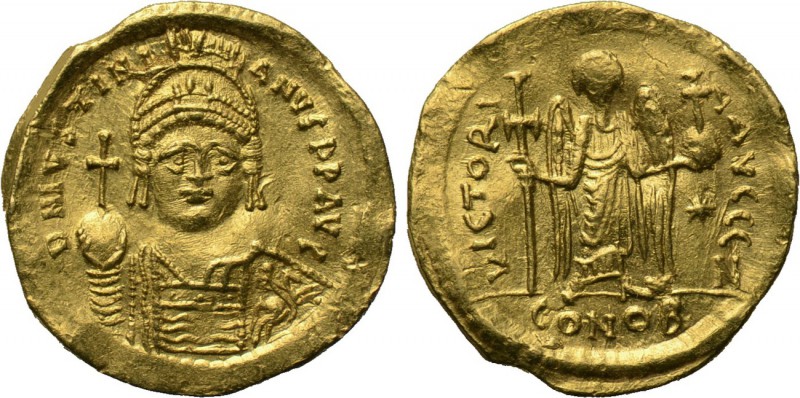 JUSTINIAN I (527-565). GOLD Solidus. Constantinople. 

Obv: D N IVSTINIANVS P ...