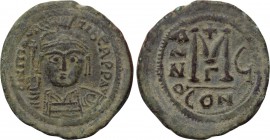 MAURICE TIBERIUS (582-602). Follis. Constantinople. Dated RY 6 (587/8). 

Obv: O N MAVRIC TIЬЄR P P AV. 
Helmeted and cuirassed facing bust, holdin...
