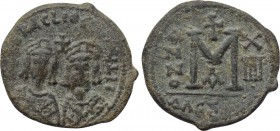 REVOLT OF THE HERACLII (608 - 620). Ae Follis. Alexandretta (?). 

Obv: DmN ERACLIO CONSULII. 
Crowned and draped facing busts of Heraclius and Her...