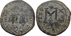 REVOLT OF THE HERACLII (608 - 620). Ae Follis. Alexandretta (?). 

Obv: DmN ERACLIO CONSULII. 
Crowned and draped facing busts of Heraclius and Her...
