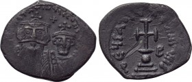 CONSTANS II with CONSTANTINE IV (641-668). Hexagram. Constantinople. 

Obv: δ N CONSTANTINЧS C CONSTAN. 
Crowned and draped facing busts of Constan...