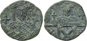 CONSTANTINE VI and IRENE (780-797). Follis. Constantinople. 

Obv: Crowned facing bust of Irene, holding cruciform sceptre and globus cruciger.
Rev...