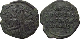 BASIL I THE MACEDONIAN with CONSTANTINE (867-886). Follis. Constantinople (or uncertain provincial mint?). 

Obv: Facing half-length busts of Basil ...