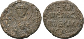 BYZANTINE LEAD SEALS. Nikolaos, bishop of Herakleia? (Circa 8th-9th centuries). 

Obv: Facing bust of the Virgin Mary, holding Christ medallion on b...