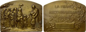 FRANCE. Plaque (1918). By Stern. Commemorating the end of World War I. 

Obv: Citizens giving thanks before the waterfront.
Rev: LA FRANCE RECONNAI...