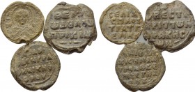 3 Byzantine seals. 

Obv: .
Rev: .

. 

Condition: See picture.

Weight: g.
 Diameter: mm.