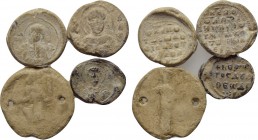 4 Byzantine seals. 

Obv: .
Rev: .

. 

Condition: See picture.

Weight: g.
 Diameter: mm.
