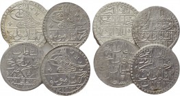 4 Ottoman coins. 

Obv: .
Rev: .

. 

Condition: See picture.

Weight: g.
 Diameter: mm.