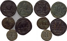 5 Byzantine coins. 

Obv: .
Rev: .

. 

Condition: See picture.

Weight: g.
 Diameter: mm.