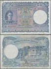Ceylon: Government of Ceylon 10 Rupees July 12th 1944, P.36Aa, small border tears, tiny holes at center and obviously washed and pressed. Condition: F...