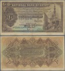 Egypt: National Bank of Egypt 10 Pounds 1918, P.14, great condition with lightly stained paper and a few stronger vertical folds. Condition: F+. Highl...