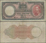 Fiji: Government of Fiji 1 Pound 1940, P.39c, minor margin splits, stained paper and several folds. Condition: F
 [plus 19 % VAT]