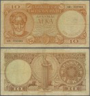 Greece: 10 Drachmai 1954 P. 186a, used with several folds, stained paper, small pen writing at right in watermark area, a 4mm tear at lower border, no...