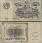Russia: 10.000 Rubles 1923, P.181, almost well worn condition with toned paper and small border tears. Condition: VG
 [taxed under margin system]
