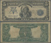 United States of America: 5 Dollars Silver Certificate series 1899, P.340 in well worn condition with folds and stains and a tiny tear in the portrait...