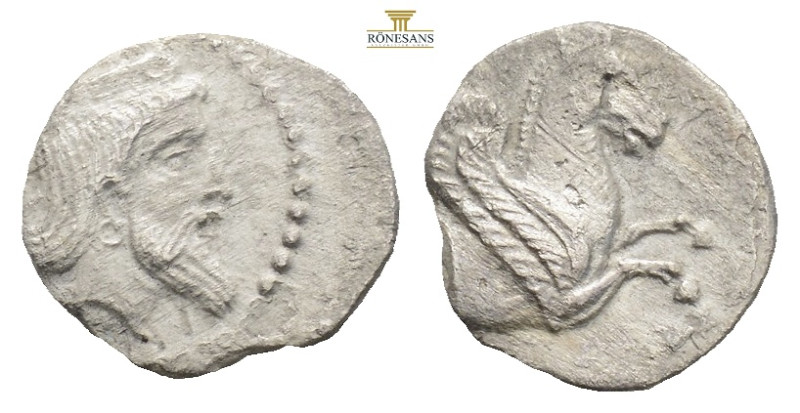 Cilicia, uncertain mint AR Obol. (0.62g, 11mm)4th century BC. Crowned and bearde...