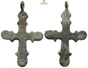 Pendant Cross. Middle Byzantine, 10thC-11thC. Cross necklace; bronze; straight; arms rounded at the ends, each with a pair of lateral protrusions.