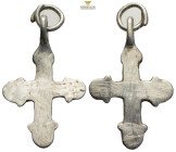 Pendant Cross. Middle Byzantine, 10thC-11thC. (3.51g, 35.4mm) Cross necklace; silver; arms rounded at the ends, each with a pair of lateral protrusion...