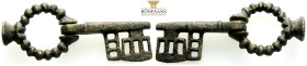 Middle Byzantine folding key AD 10th – 11th centuries. (58.73g,)
A bronze key attached to large moveable ring; rectangular bit pierced with slits.