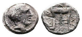 Macedon. Chalkidian League. Circa 425-420 BC. Silver Obol ( 11 mm, 0.68g.). Olynthos mint. Laureate head of Apollo right. Rev. Tripod. Rare. Very fine...