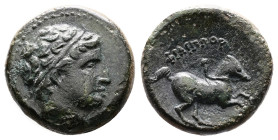 Kings of Macedon, Philip II, 356-336 BC. Uncertain mint in Macedonia. Bronze ( 18 mm, 6.23 g.). Diademed head of Apollo to right. Rev. ΦΙΛΙΠΠΟΥ, Youth...