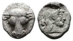Phokis. Phokian League, circa 500-480 BC. Federal coinage. Silver Triobol (12.4 mm, 2.66 g). Frontal bull’s head. Rev. Head of Artemis to right, her h...