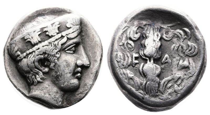 Olympia. 92nd Olympiad. 412 BC. Silver Stater ( 21 mm, 12.35 g.). Head of Hera r...