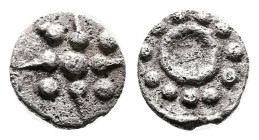 Uncertain mint, possibly Peloponnesos, 5th-4th century BC. AR Hemiobol (8.0 mm, 0.35 g.). Six pointed star with pellets on each arm. Rev. Large O surr...