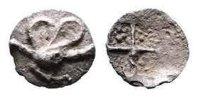 Uncertain, late 6th-early 5th centuries BC. Silver Tetartemorion (6 mm, 0.12 g.). Rosette. Rev. Incuse square. Obverse struck slightly off center, oth...