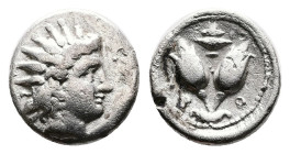 Islands of Caria, Rhodos, Rhodes, circa 275-250 BC. Silver Diobol ( 10 mm, 0.95 g.). Radiate head of Helios to right. Rev. P - O Two rose buds; above,...
