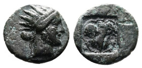 Islands off Caria. Rhodes, ca. 188-84 BC. Bronze ( 13 mm, 1.65 g.). Radiate head of Helios to right. Rev. Rose with bud to left and right, all within ...