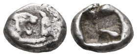 Greek Kings of Lydia. Sardeis. Kroisos 560-546 BC. 1/12 Siglos AR Confronted foreparts of lion right, with extended right foreleg, and bull left / Inc...