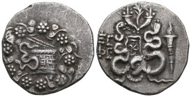 Greek IONIA. Ephesos. 133-67 BC. Cistophoric Tetradrachm (Silver), year 66 = 69-68 BC. Cista mystica from which snake coils; all within ivy wreath. Re...