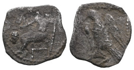 Cilicia, uncertain mint. AR Obol. Cilicia, uncertain mint. AR Obol. 4th C. Baaltars seated l., holding grain ear, grape-bunch and sceptre / Eagle stan...
