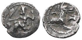 Greek CILICIA. Uncertain mint or satrap. Circa 4th Century B.C. AR obol. Baaltars seated on throne left, holding grain ear and scepter / Forepart of w...