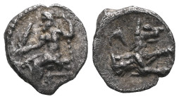 Greek CILICIA. Uncertain mint or satrap. Circa 4th Century B.C. AR obol. Baaltars seated on throne left, holding grain ear and scepter / Forepart of w...