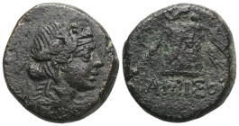 Greek Pontos. Amisos. Time of Mithradates VI Eupator circa 120-63 BC. Bronze Æ Head of Dionysos right, wearing ivy wreath / AMIΣOY, Thyrsos leaning ag...
