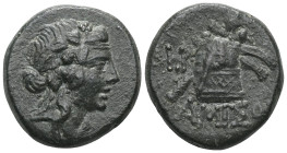 Greek Pontos. Amisos. Time of Mithradates VI Eupator circa 120-63 BC. Bronze Æ Head of Dionysos right, wearing ivy wreath / AMIΣOY, Thyrsos leaning ag...