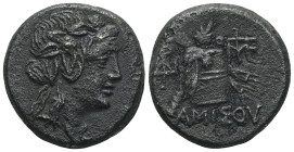 Greek Pontos. Amisos. Time of Mithradates VI Eupator circa 120-63 BC. Bronze Æ Head of Dionysos right, wearing ivy wreath / AMIΣOY, Thyrsos leaning ag...