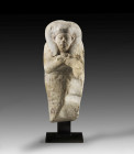 Shabti of princess (?) Ahmose. Limestone with some rests of colour, H 21,3cm. Second Intermediate Period, 17th dynasty, ca. 1560 - 1540 BC. Mummy-shap...