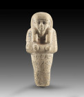 A limestone shabti of Amenhotep, Limestone with traces of color, H 20.5cm. New Kingdom. 18th dynasty, time of Thutmosis IV, 1397 - 1388 BC. Mummy-shap...