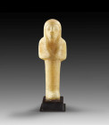 Shabti of prince Month-her-chepeschef. New Kingdom, 20th dynasty, time of Ramses IX, circa 1127-1109 BC. Alabaster. Details painted in black and red c...