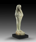 A turquoise Shabti of Hor-maa-cheru, born by Tjs-Hor-peret . Late Period, 30th dynasty, circa 359 - 341 BC. Mummy-shaped with a back pillar, a tripart...