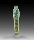 Shabti of Ikaros. Turquoise faience, H 16.8cm. Ptolemaic, circa 330 - 30 BC. Probably from Sakkara. Mummy-shaped with a back pillar, a tripartite wig,...