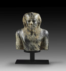 A bust of the Pharao Mykerinos, Old Kingdom, 4th dynasty, 2489 - 2462 BC. The bare torso of a muscular man with a ceremonial beard and nemes headscarf...