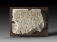 A fragment of a limestone stele depicting Paser, the most important vizier of Ramses II., and his scribe Ramose und front of the pharao Ramses II. The...