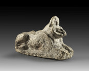 An unfinished(?) figure of the god Amun as a ram-sphinx in lion form crowned by a sun disk. New Kingdom, 19th - 20th dynasty, 1292 - 1070 BC. Limeston...