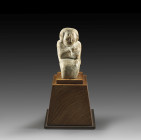 Lady on throne - mother of Cheops(?), Predynastic Period - Old Kingdom, 1st - 4th dynasty, 3032 - 2462 BC. Limestone. H 6,3cm. Sitting on a throne wit...
